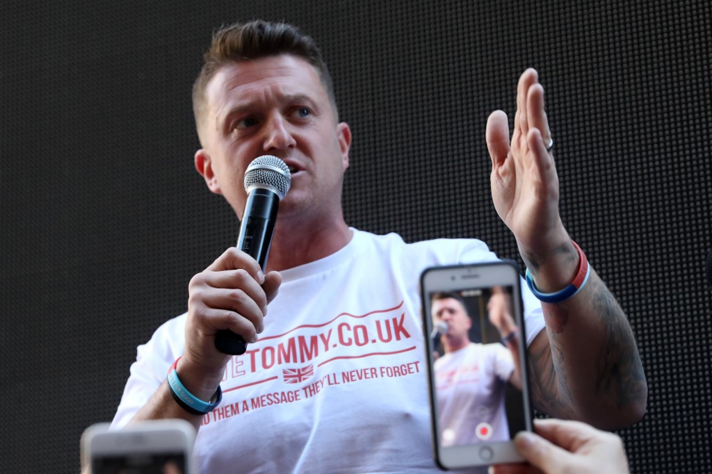 Tommy Robinson addresses supporters in central London on 14 May (AFP)