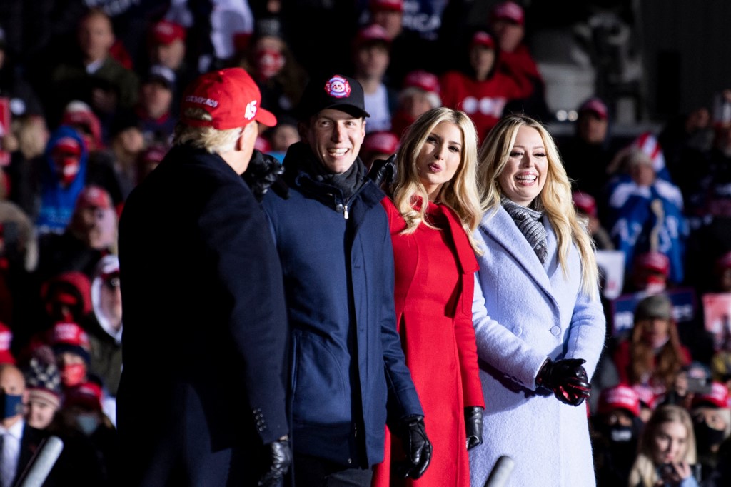 Kushner, along with Ivanka and Tiffany Trump, listen to then-US President Donald Trump speak in Wisconsin on 2 November 2020 (AFP)