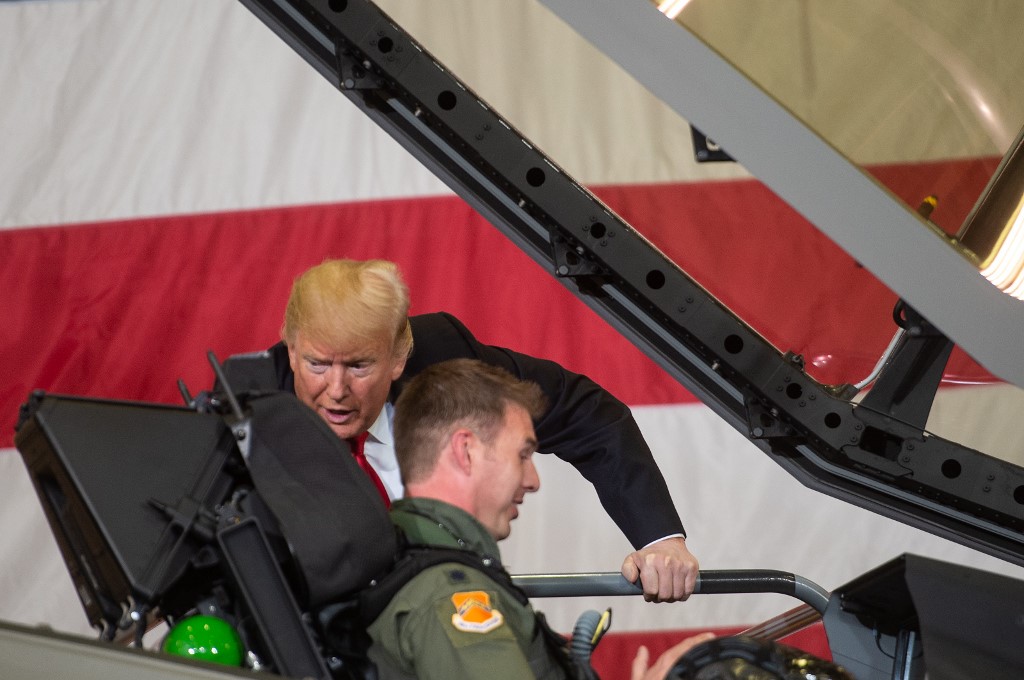 US President Donald Trump speaks with an F-35 pilot in Arizona in 2018 (AFP)