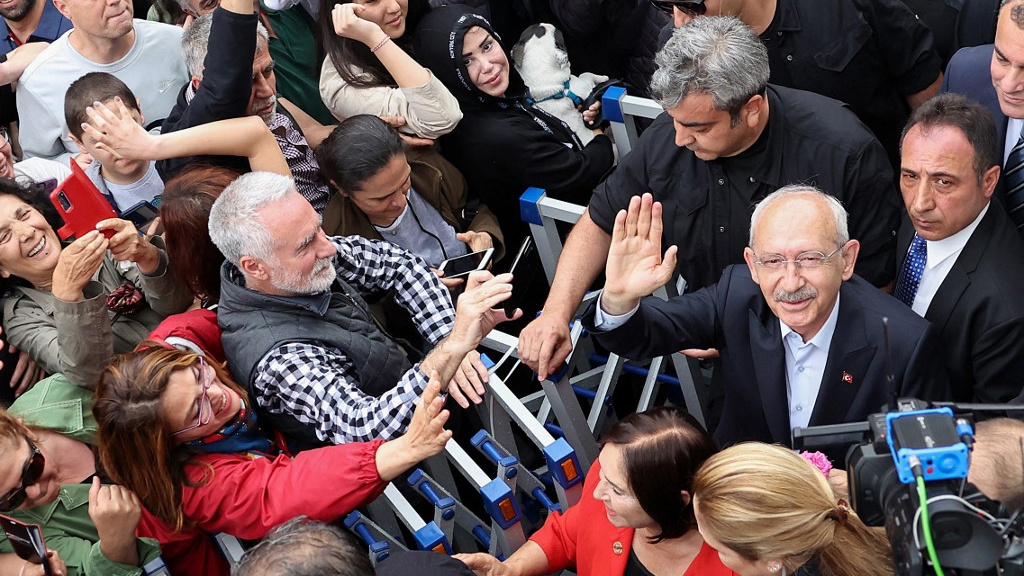 CHP leader Kemal Kilicdaroglu waves to supporters in Ankara on 28 May 2023 (AFP)