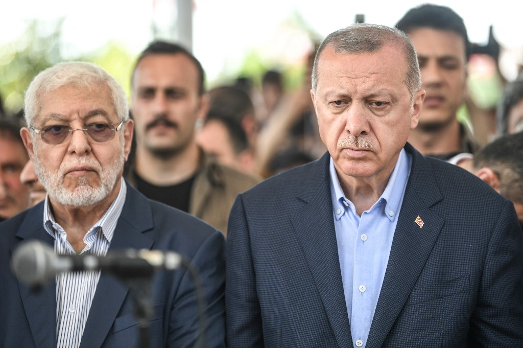 turkey erdogan praying morsi funeral