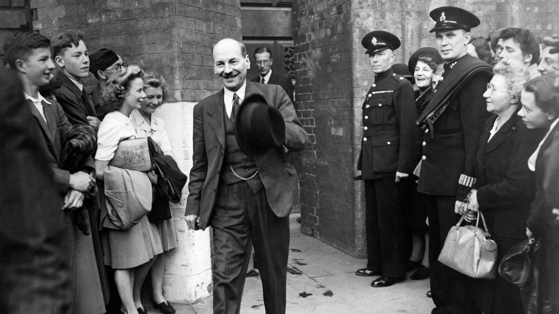 British leader of the Labour Party Clement Attlee leaves the Treasury after a long session on May 27, 1945 in London.