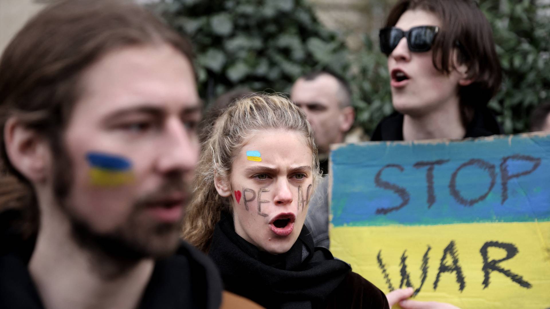 Ukrainian citizens protest against Russia's military operation in Ukraine in front of the Russian embassy in Paris on February 24, 2022.