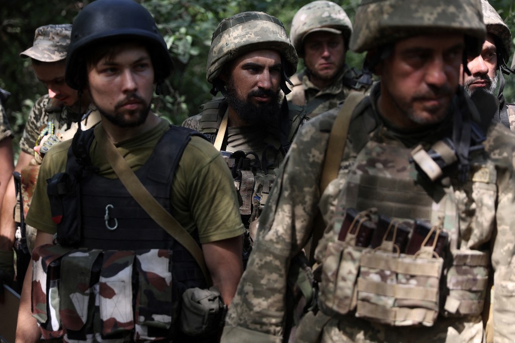Ukrainian soldiers gather in the Donetsk region on 15 August 2022 (AFP)