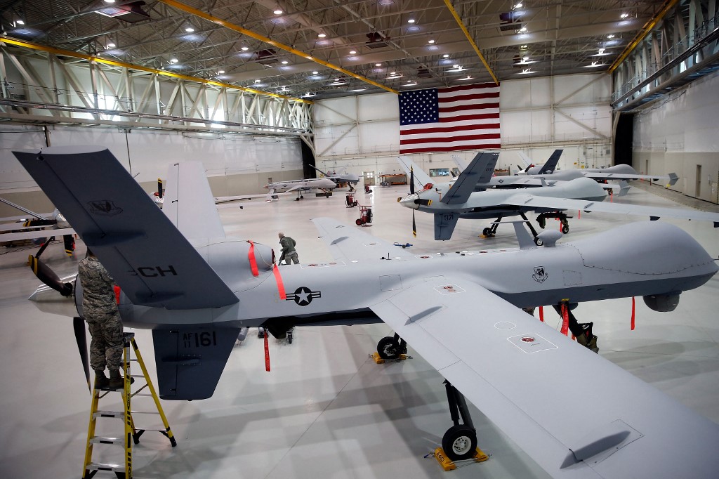 Drones are parked in a hangar in the US state of Nevada in 2015 (AFP)